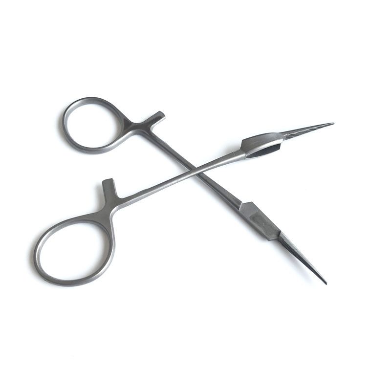 A net-shape MIM manufacturer's guide to surgical scissor handles, box-lock pivots, and ratchet mechanisms. What MIM produces well, and what still needs grinding.
